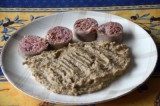 Saucisson à cuire avec purée aux cèpes